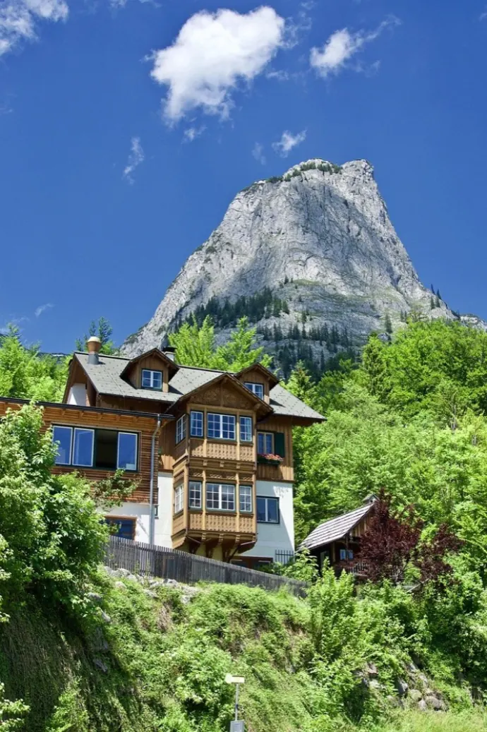 Chalet beneath an alpine peak